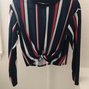 long sleeve red white and blue. tie in the front.
